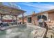 Large brick home with a patio, hot tub, grill and backyard at 3200 Eastman Ave, Boulder, CO 80305