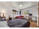 Bedroom with view to sitting area, hardwood floors and ample natural light at 3200 Eastman Ave, Boulder, CO 80305