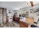 Kitchen with stainless steel appliances, breakfast bar and large window bringing in natural light at 3200 Eastman Ave, Boulder, CO 80305