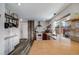 Wide kitchen view with rustic wood accents and stainless steel appliances at 3200 Eastman Ave, Boulder, CO 80305