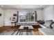 Cozy living room with a built-in window seat, hardwood floors, and a view of the outdoors at 3200 Eastman Ave, Boulder, CO 80305