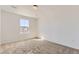 Cozy bedroom with neutral carpet, a window, and ample natural light at 6719 Juniper Dr, Thornton, CO 80602