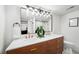 Modern basement bathroom with double vanity and a walk-in shower at 3911 Vallejo St, Denver, CO 80211