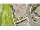 Aerial view shows the townhomes' roof renovations and manicured lawns in a well-maintained community at 3751 W 136Th Ave # F4, Broomfield, CO 80023