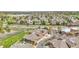 This aerial view highlights the community's serene location near a pond and well-kept green spaces at 3751 W 136Th Ave # F4, Broomfield, CO 80023
