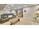 Basement with a plush leather sofa, neutral carpet, and recessed lighting at 3751 W 136Th Ave # F4, Broomfield, CO 80023