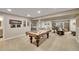 Basement with a pool table, carpeted floors, recessed lighting, and a comfortable seating area at 3751 W 136Th Ave # F4, Broomfield, CO 80023