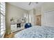 Spacious bedroom with white wood dresser, shuttered window, and plush carpet at 3751 W 136Th Ave # F4, Broomfield, CO 80023
