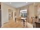 Bright dining room with hardwood floors, a large window, and neutral tones at 3751 W 136Th Ave # F4, Broomfield, CO 80023