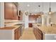 Well-appointed kitchen with granite countertops, stainless steel appliances, and ample cabinet space at 3751 W 136Th Ave # F4, Broomfield, CO 80023