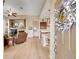 Inviting living area with hardwood floors, fireplace, and seamless flow into the kitchen at 3751 W 136Th Ave # F4, Broomfield, CO 80023
