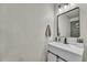 Charming bathroom features a sleek vanity, modern fixtures, and stylish decor at 7946 S Kittredge St, Englewood, CO 80112