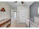 Well-lit bedroom featuring a crib, closet, and inviting interior at 7946 S Kittredge St, Englewood, CO 80112
