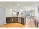 Modern kitchen with stainless steel appliances and dark brown cabinets at 7946 S Kittredge St, Englewood, CO 80112