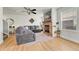 Comfortable living room featuring a fireplace and ample seating at 7946 S Kittredge St, Englewood, CO 80112