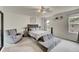 Inviting main bedroom with ceiling fan and abundant natural light from windows at 7946 S Kittredge St, Englewood, CO 80112