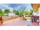 Inviting back deck overlooks the backyard and landscaping at 6631 Welch Ct, Arvada, CO 80004