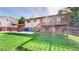 Lush backyard boasts a spacious deck and patio, perfect for entertaining or relaxing outdoors at 6631 Welch Ct, Arvada, CO 80004