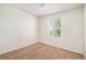 Cozy bedroom with a well-placed window and ample electrical outlets at 20108 Randolph Pl, Denver, CO 80249