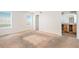 Expansive bedroom featuring dual windows and an ensuite bathroom for added privacy at 20108 Randolph Pl, Denver, CO 80249