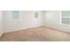 A bright and open bedroom with multiple windows at 20108 Randolph Pl, Denver, CO 80249