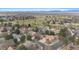 Aerial view of home near a golf course, mature trees, and landscaping in a quiet neighborhood at 11545 Quivas Way, Westminster, CO 80234