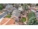 Aerial view of home with a beautiful yard, deck, patio, mature trees and landscaping at 11545 Quivas Way, Westminster, CO 80234