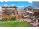Spacious backyard with deck, patio, mature landscaping and beautiful outdoor spaces at 11545 Quivas Way, Westminster, CO 80234