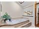 Relaxing bathroom with a soaking tub, large window, and natural light at 11545 Quivas Way, Westminster, CO 80234