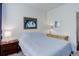 Cozy bedroom with a comfortable bed, side tables, and a neutral color scheme at 3993 S Dillon Way # 104, Aurora, CO 80014
