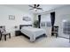 Bright bedroom featuring a comfortable queen-size bed and ample closet space at 3993 S Dillon Way # 104, Aurora, CO 80014