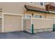 Exterior of house with a private patio and adjacent garage, combining convenience and outdoor space at 3993 S Dillon Way # 104, Aurora, CO 80014