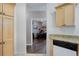 Kitchen with light wood cabinets and granite countertops, adjacent to an office area at 3993 S Dillon Way # 104, Aurora, CO 80014