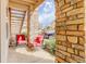 Cozy patio with comfortable seating, brick accents, and a relaxing outdoor ambiance at 3993 S Dillon Way # 104, Aurora, CO 80014