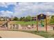 Community playground with modern equipment, green space, and easy access to nearby residences at 3993 S Dillon Way # 104, Aurora, CO 80014