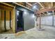 Unfinished basement with a unique bathroom addition at 9445 E 106Th Pl, Commerce City, CO 80640