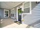Inviting front porch area showcasing a decorative front door, ample natural light, and stylish accents at 9445 E 106Th Pl, Commerce City, CO 80640
