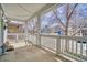 Relaxing front porch with decorative railings that offers an inviting space to enjoy the outdoors and neighborhood views at 9445 E 106Th Pl, Commerce City, CO 80640