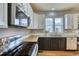 Stylish kitchen featuring modern appliances, elegant cabinetry, and a functional layout for cooking and entertaining at 9445 E 106Th Pl, Commerce City, CO 80640