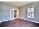 Home office with glass doors and a large window at 9445 E 106Th Pl, Commerce City, CO 80640