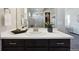 Contemporary bathroom features vanity with modern faucet and stylish decor at 17577 W 87Th Ave, Arvada, CO 80007