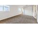 Bedroom featuring plush carpet, a window, and a closet with sliding doors at 11039 Columbine St, Northglenn, CO 80233