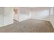 Bedroom featuring plush carpet, light walls, and a closet with sliding doors at 11039 Columbine St, Northglenn, CO 80233