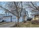 Charming two-story light blue home, featuring a two car garage and inviting front entrance at 11039 Columbine St, Northglenn, CO 80233