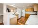 Bright kitchen with white countertops, wood cabinets, and stainless steel appliances at 11039 Columbine St, Northglenn, CO 80233