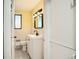 Updated bathroom featuring a modern vanity, fixtures, and patterned tile flooring at 1000 E 8Th Ave # 4, Denver, CO 80218