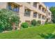 Apartment building exterior with awnings and landscaping at 1000 E 8Th Ave # 4, Denver, CO 80218