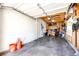 Spacious garage featuring ample storage and workbench area at 1183 S Umatilla St, Denver, CO 80223