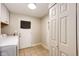 Laundry room area featuring washer and dryer hookups at 1183 S Umatilla St, Denver, CO 80223