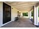 Covered patio providing a great outdoor living space at 1183 S Umatilla St, Denver, CO 80223